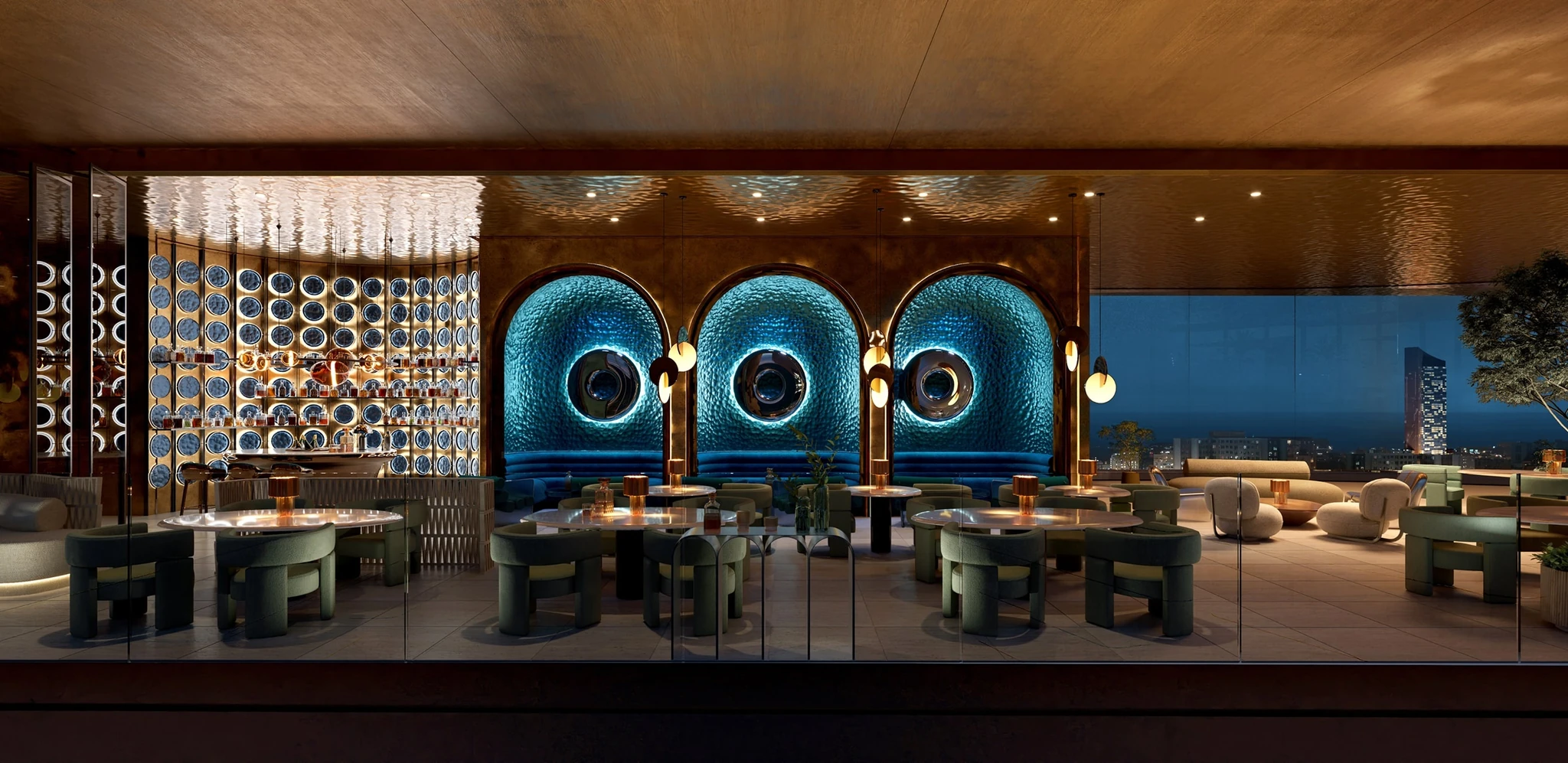 Interior of a luxury rooftop bar and lounge with three blue backlit arched alcoves holding curved banquette seating, a golden backlit shelf display, round marble tables with green velvet chairs, and floor-to-ceiling windows showing a city skyline at dusk.